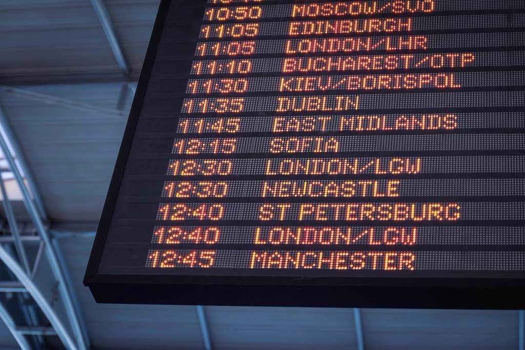 low-angle shot departure board airport — When do Chuseok flights sell out — and why this week matters