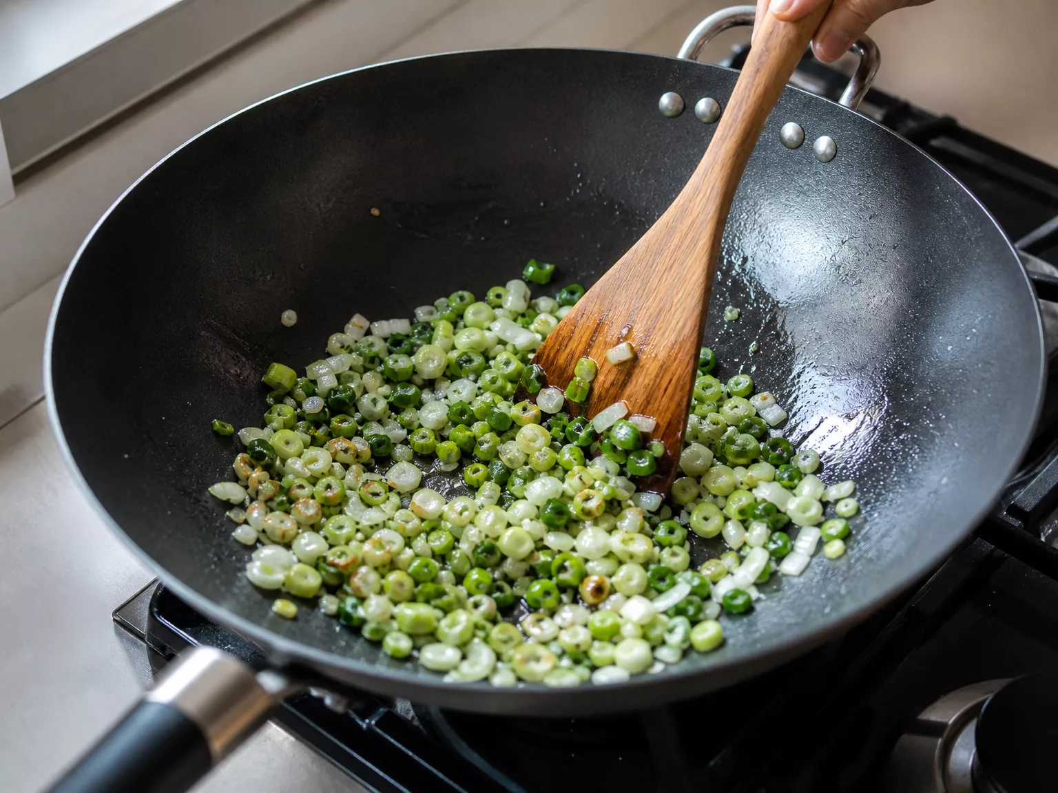 Step 1: Fry chopped scallion (and onion) in neutral oil over medium heat
