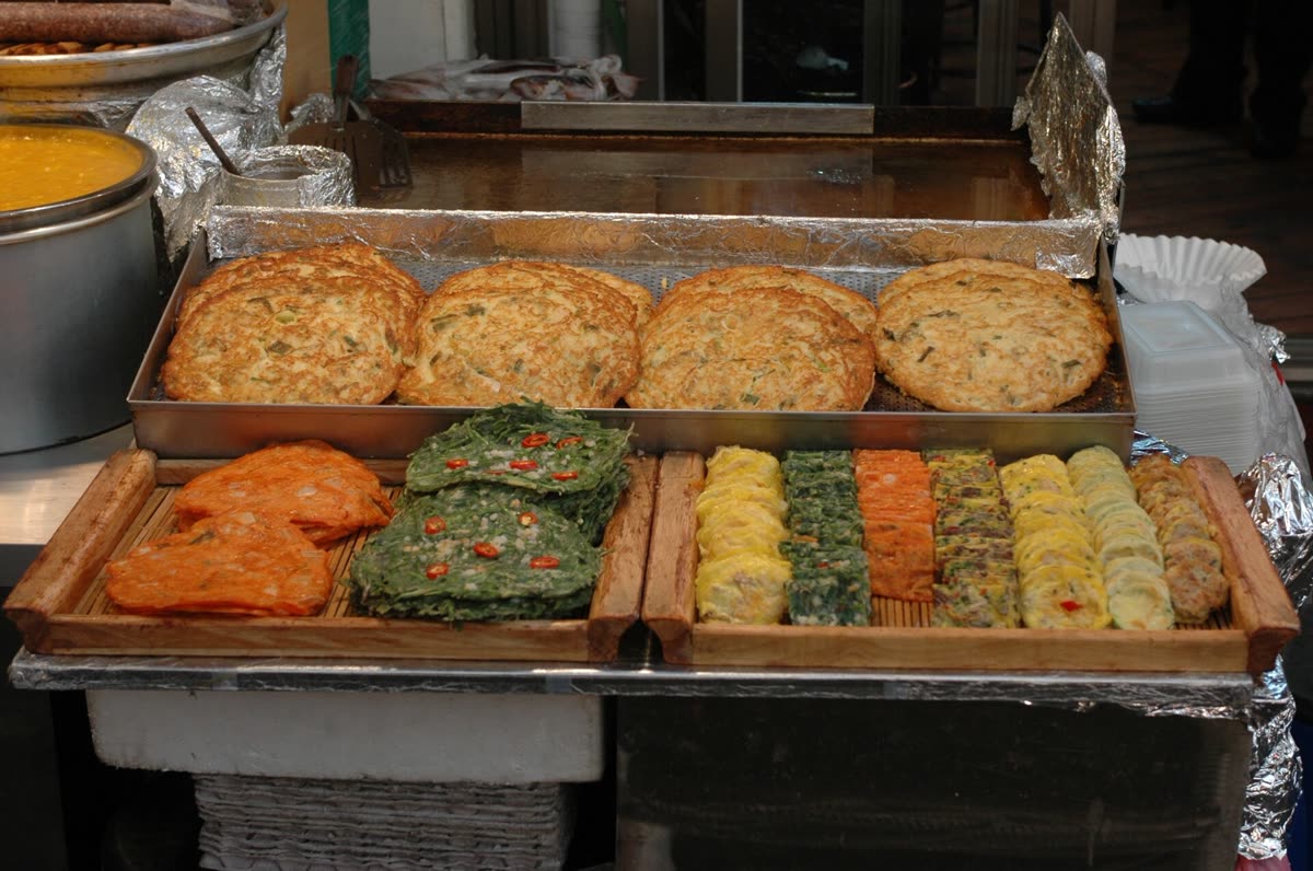 Korean pancakes and pan-fried foods at Gwangjang Market — What to Eat at Koreatown Plaza: The Short Answer