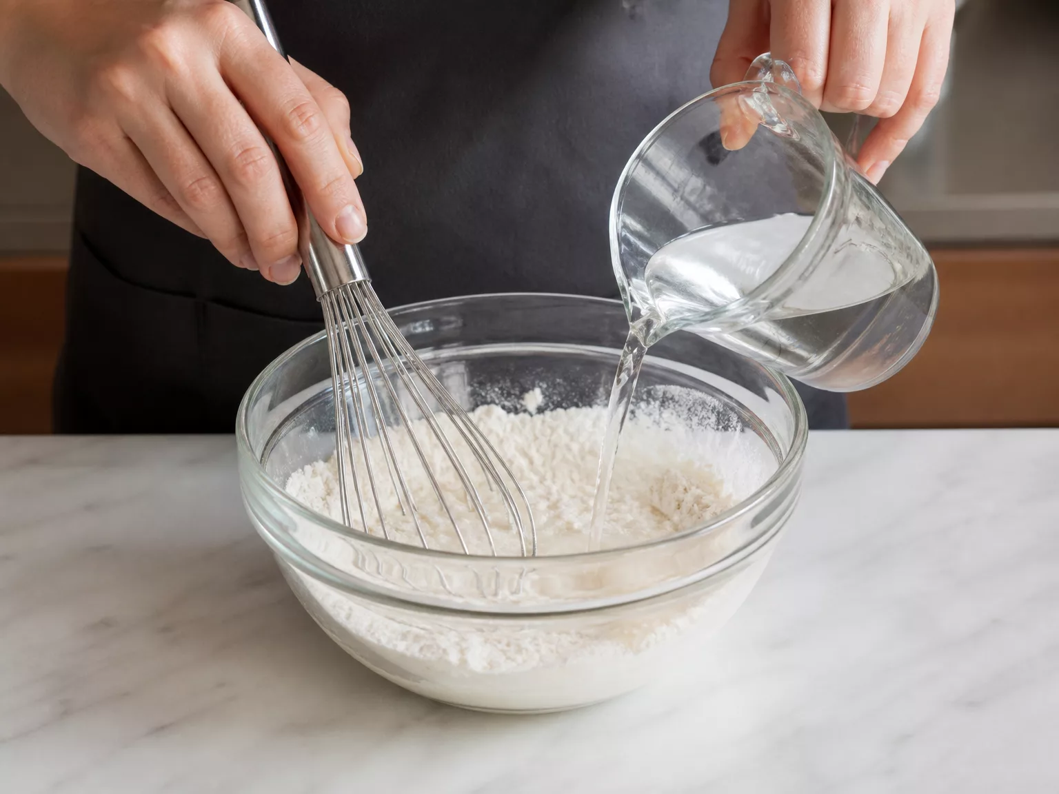 Step 2: Add 1 cup (200 ml) cold water and mix to a thin batter.