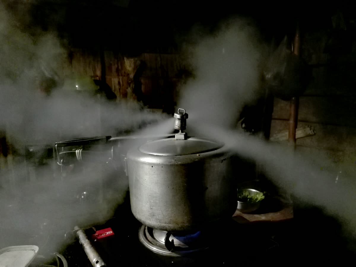 Pressure cooker releasing water vapor — How Long Does Samgyetang Take? (By Pot Type)