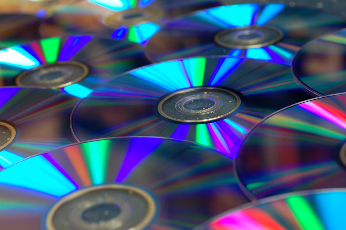 Blank Recordable DVD-R Discs underside shallow focus — Can You Buy or Rent Squid Game? No Listing Exists