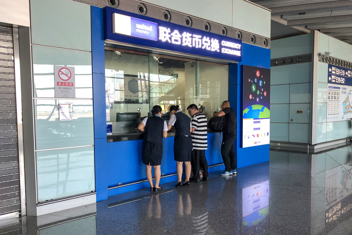 Currency exchange counter at ZBAA T3E Departures (20180823110519) — Is now a good time to exchange USD for won?