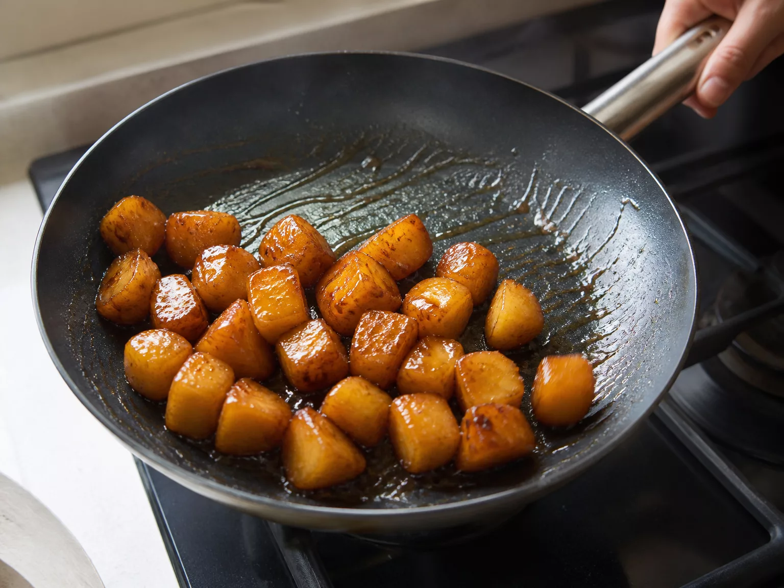 Step 6: Uncover, raise the heat, and swirl the pan for 3–5 minutes