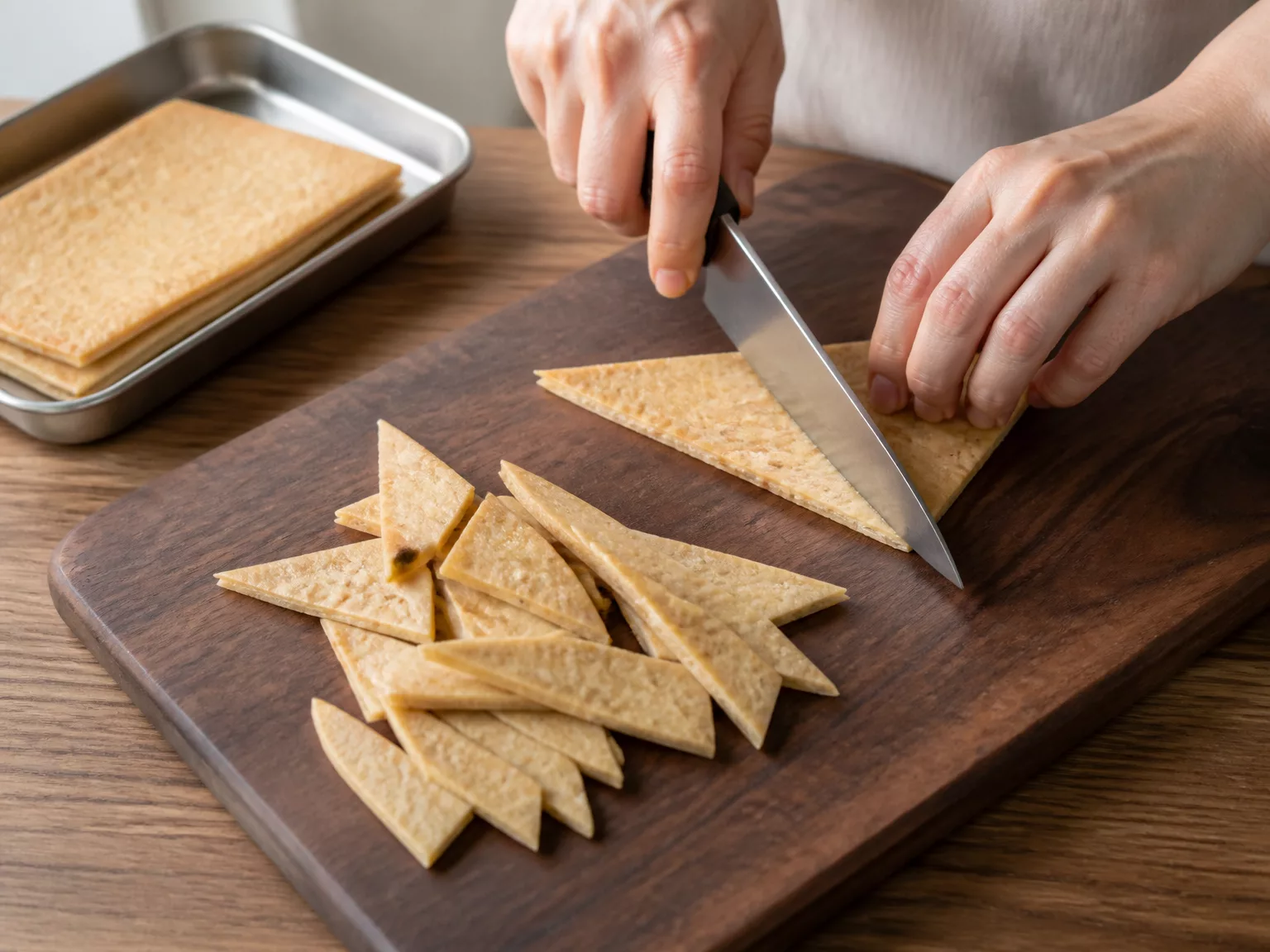 Step 3: Cut the sheets into triangles or strips, cutting against the fold so…
